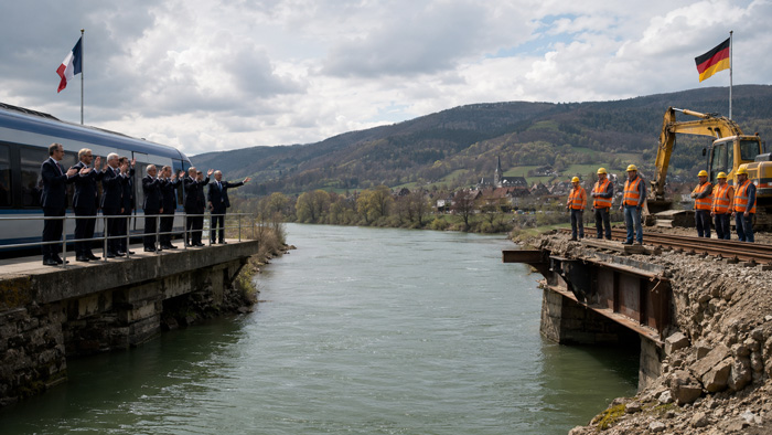 Illustration satirique du projet ferroviaire Colmar–Freiburg bloqué faute de financement