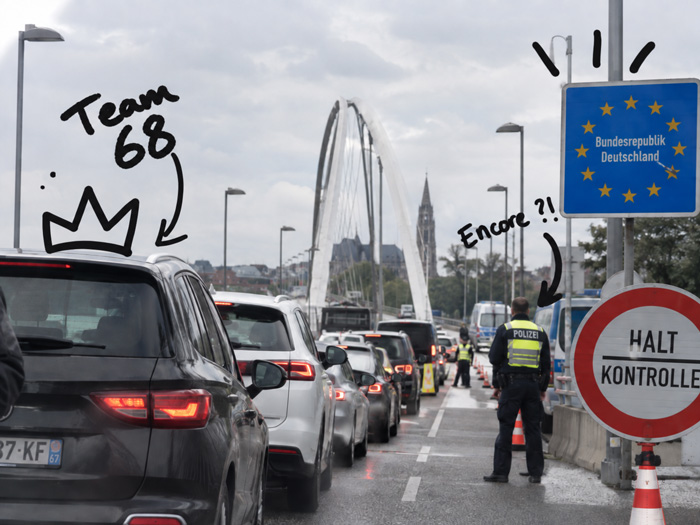 File de voitures lors d’un contrôle à la frontière allemande, avec annotations au marqueur noir