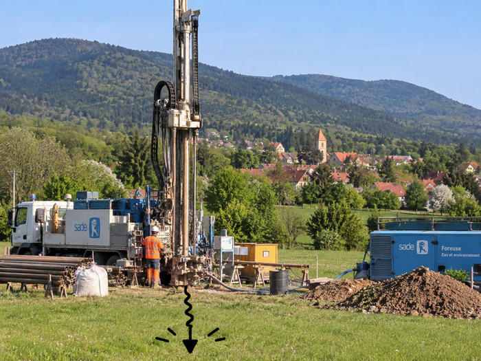 Foreuse de prospection dans un pré devant le village de Wattwiller, au pied des Vosges