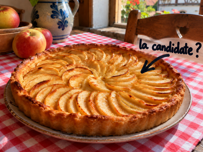 Tarte aux pommes sur une nappe à carreaux rouges et blancs pour le concours de l’Écomusée d’Alsace